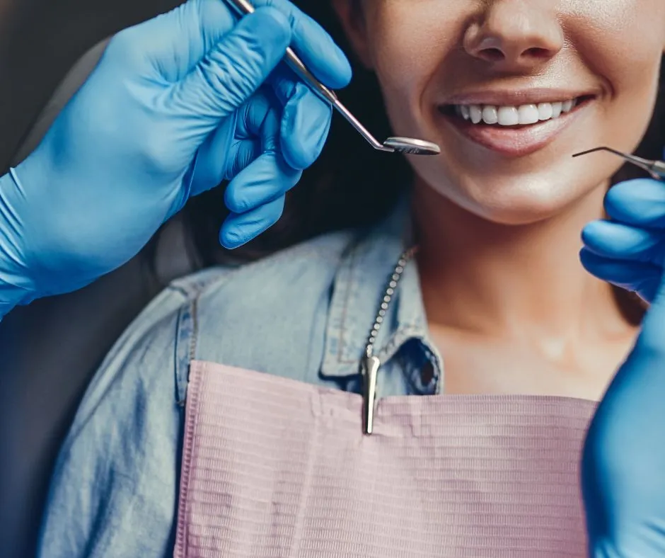 Patient smiling after dental treatment in India
